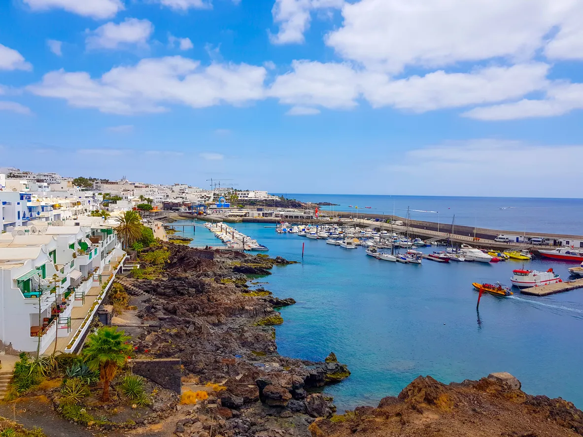 Promenade along ocean coast in Puerto del Carmen holiday town, Lanzarote, Canary Islands, Spain