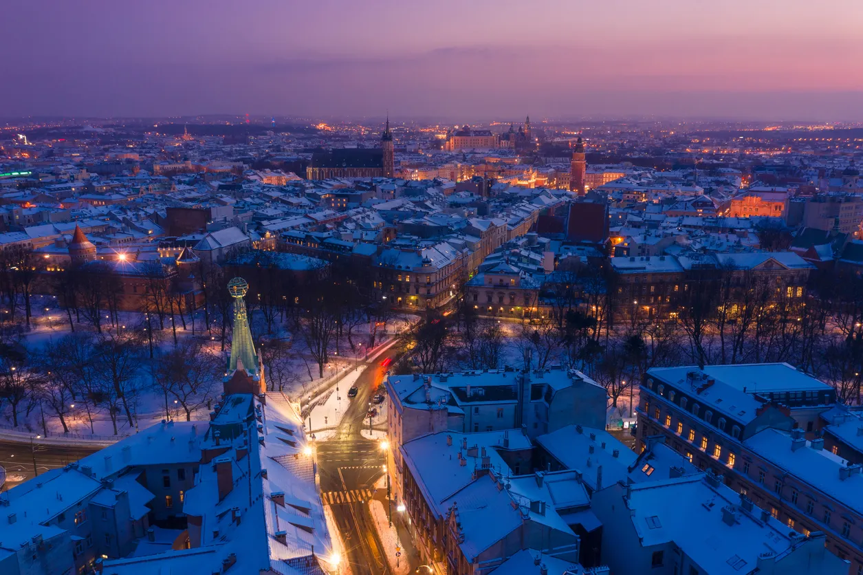 Krakow city center old Town at winter aerial view. Globe tower on Basztowa street, Pod Globusem, and St. Mary