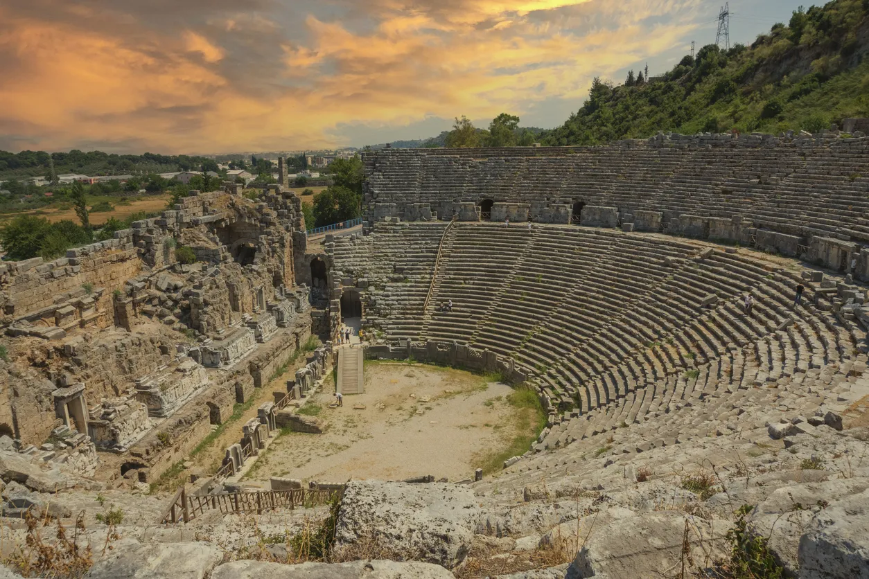 Perge Ancient City Amphitheatre. Perge, one of the Pamphylian cities and was believed to have been built in the 12th to 13th centuries BC. Cloudy Sky