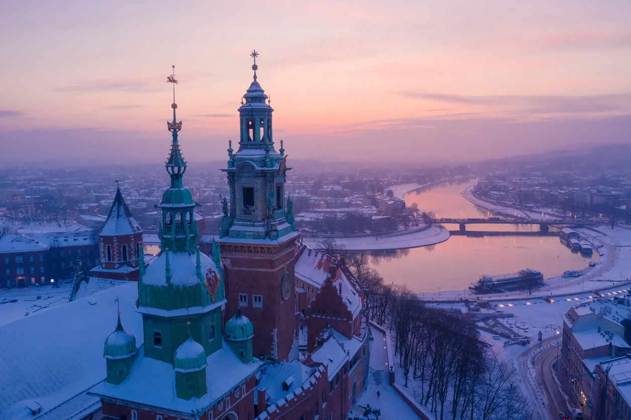 Wawel cathedral and Vistula river in Krakow Poland at sunset aerial view