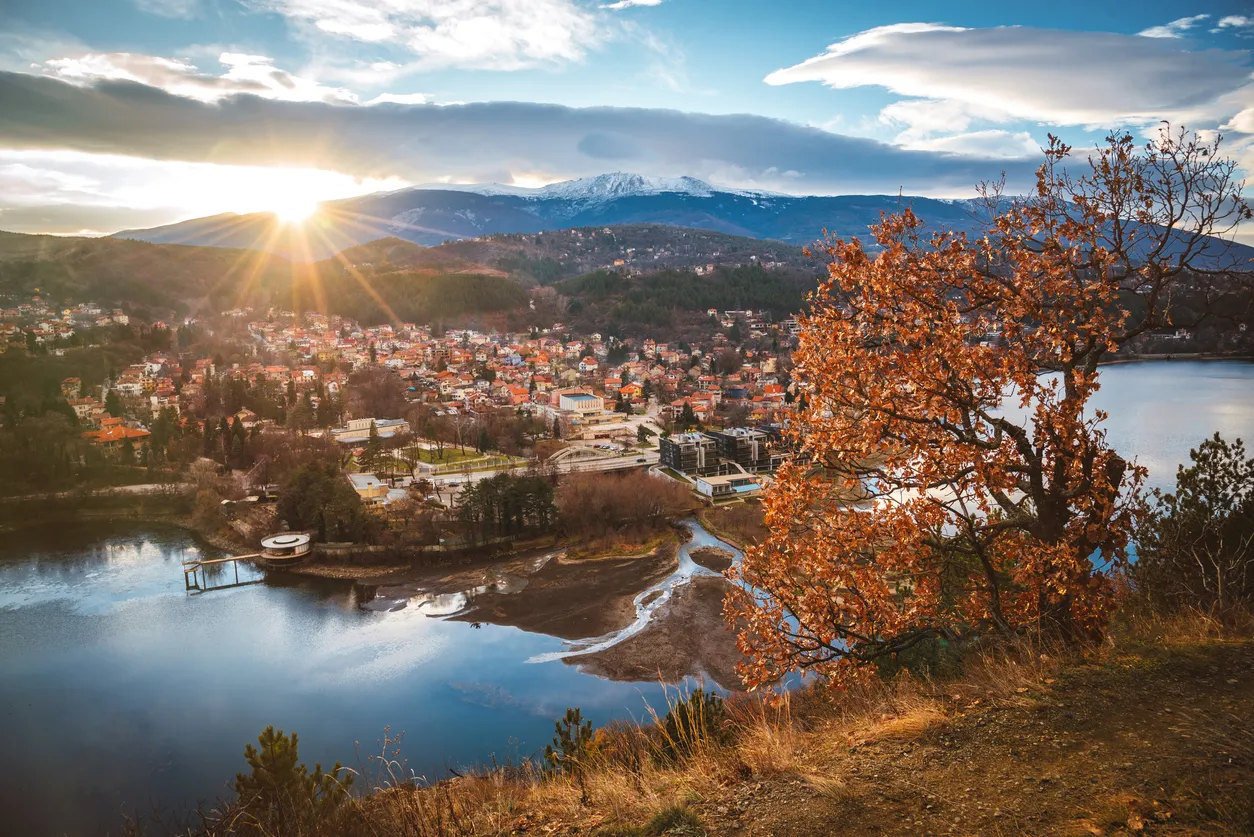 Beautiful sunset near Sofia, Bulgaria - Pancharevo lake and autumn trees