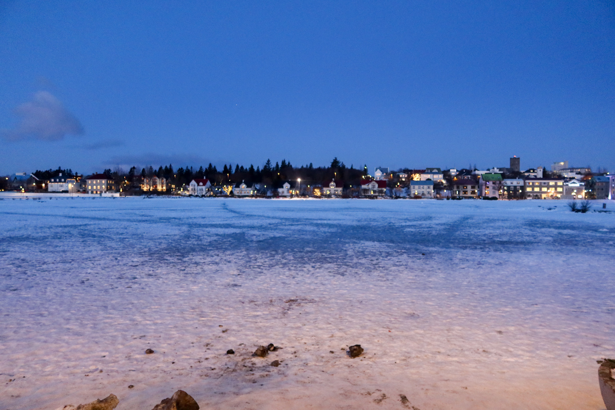 Tjornin Lake in Rejykjavik city centre, in dusk light. 